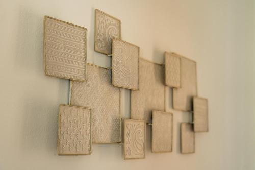 a group of wooden blocks on a wall at Seven Boutique Hotel in Ascona