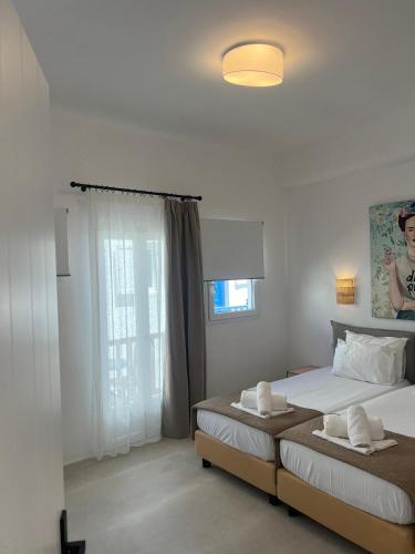 Letto o letti in una camera di 23 Hotel Mykonos