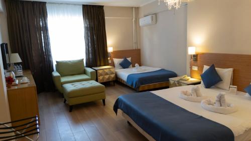 Llit o llits en una habitació de Park Hotel