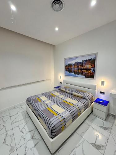 Postel nebo postele na pokoji v ubytování B&B Rossini Luxury 3