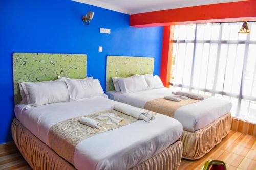 Voodi või voodid majutusasutuse The Forest View Resort ltd toas