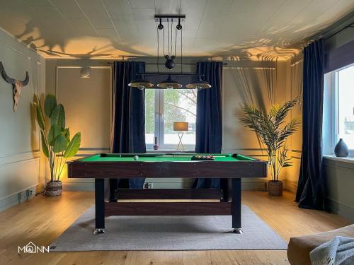 a living room with a pool table in it at Piteå Relax and Play Billiard Ap1 in Piteå