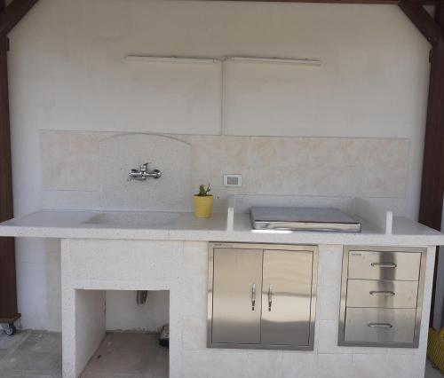 Kuchyň nebo kuchyňský kout v ubytování Agriturismo Masseria San Basilio