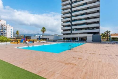 Apartamento H&M con Padel, Piscina y vistas al mar