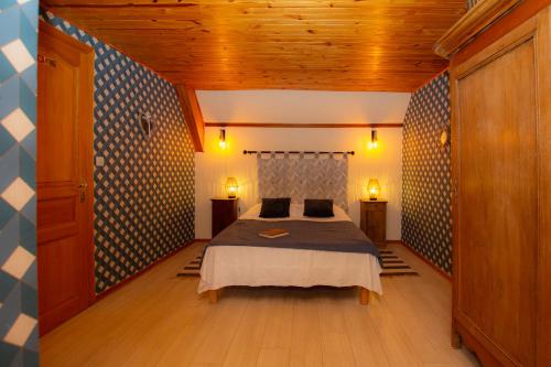Ένα ή περισσότερα κρεβάτια σε δωμάτιο στο Auberge du Blaisel
