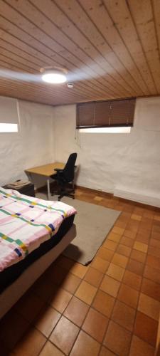 Ένα ή περισσότερα κρεβάτια σε δωμάτιο στο Big and cozy room in the middle of trondheim