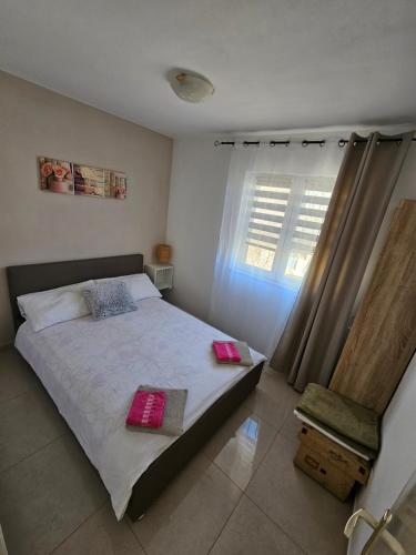 Katil atau katil-katil dalam bilik di Apartments Aurora