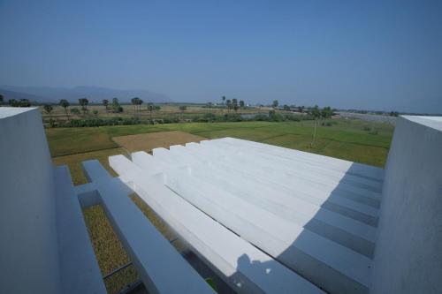 an overhead view of a white roof on a building at Suhana Aangan Homestay in Tirupati