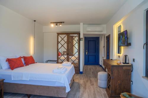 Ένα ή περισσότερα κρεβάτια σε δωμάτιο στο Aris Guest House