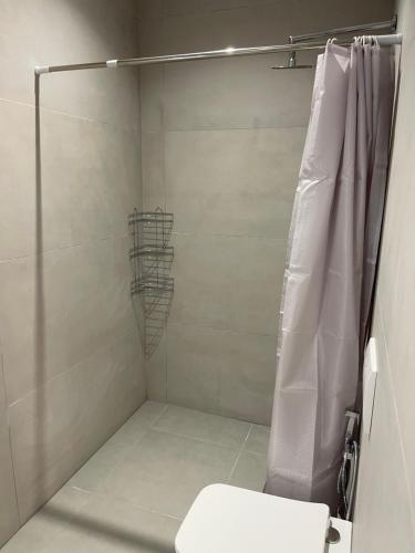 Ένα μπάνιο στο Guest House White Villa