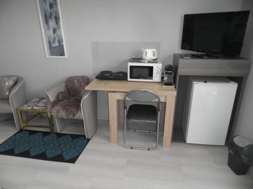Dapur atau dapur kecil di Grande chambre à louer