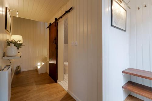 a hallway with a door leading to a bathroom at 1 bed home in Eckington in Eckington
