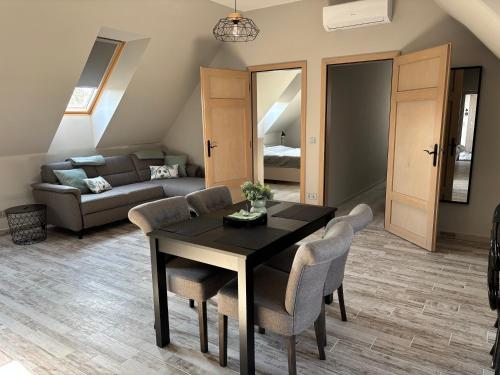 Posezení v ubytování Völgyhíd Apartman