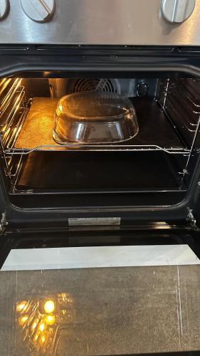 a pan is sitting in an oven at Stylish & central #LoftWerk 2 in Velbert