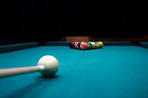 a snooker balls on top of a pool table at Hotel Jakuszyce Sport & Spa in Szklarska Poręba