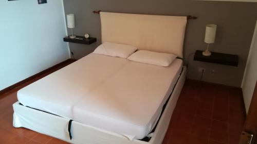 Una cama o camas en una habitación de Mirto 29