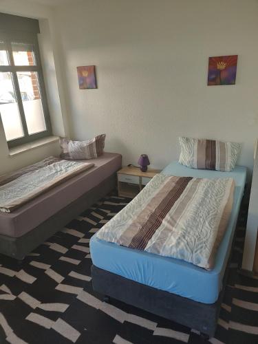 Ένα ή περισσότερα κρεβάτια σε δωμάτιο στο Hostel Schützenbrücke