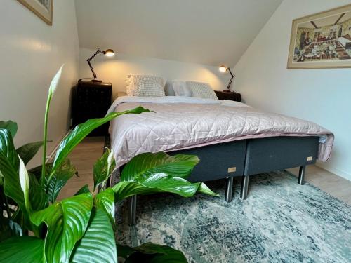 Postel nebo postele na pokoji v ubytování Penthouse-lägenhet med två sovrum & terass med havsutsikt