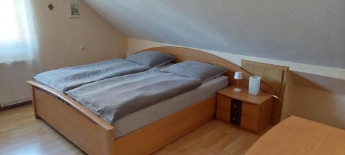 Postel nebo postele na pokoji v ubytování Laukarts Garden