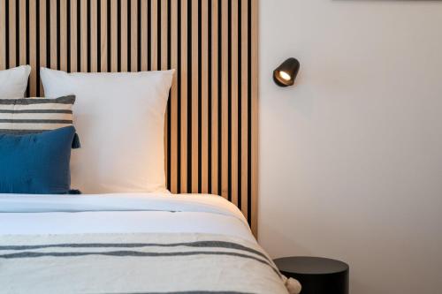 Ένα ή περισσότερα κρεβάτια σε δωμάτιο στο Studio confortable proche métro et commerces