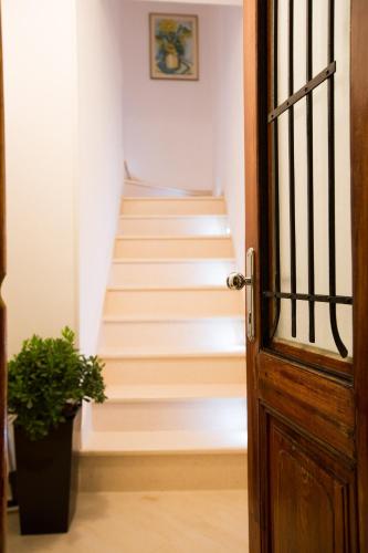 an open door with a staircase in a house at Casa Arancia in Dubrovnik
