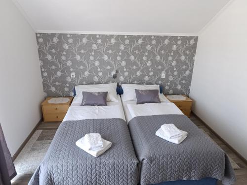 Posteľ alebo postele v izbe v ubytovaní Guest House Toic