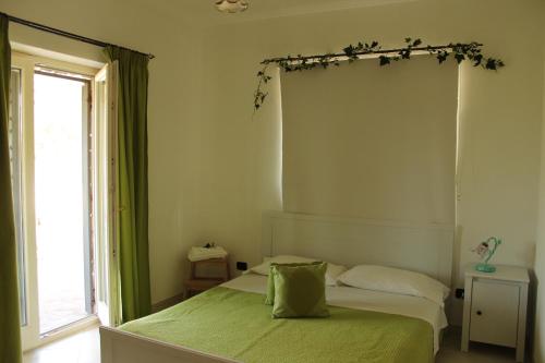 Katil atau katil-katil dalam bilik di Le Rocce