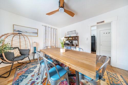 a dining room with a wooden table and chairs at Kenmore Akron 3 bedroom 1 bath in Akron