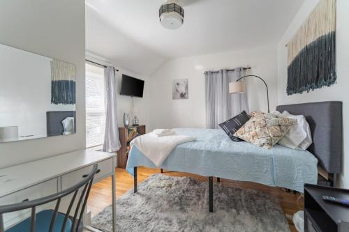 Ένα ή περισσότερα κρεβάτια σε δωμάτιο στο Kenmore Akron 3 bedroom 1 bath