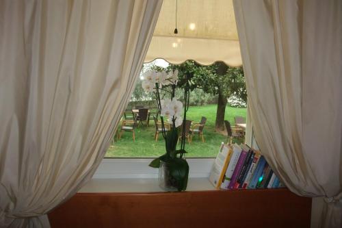 Um jardim em Albergo Valentina