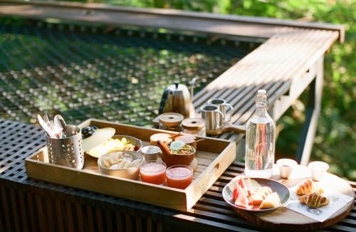 a tray of food sitting on top of a table at Chaberské stany in Prague