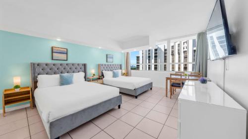 SeaStays Apartmentsにあるベッド