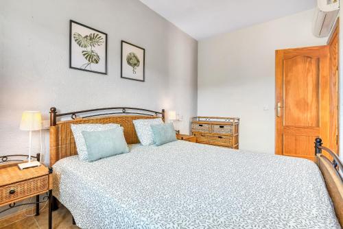 Ένα ή περισσότερα κρεβάτια σε δωμάτιο στο Maya