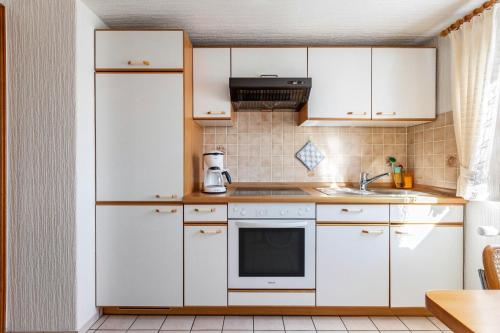 Una cocina o cocineta en Gästehaus Siegrid Düring