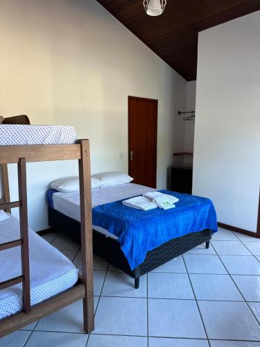 Postel nebo postele na pokoji v ubytování Pousada Encanto Torrely Búzios