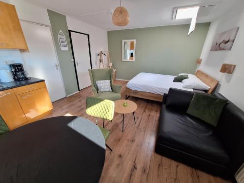Ένα ή περισσότερα κρεβάτια σε δωμάτιο στο Appartementen Zandvoort