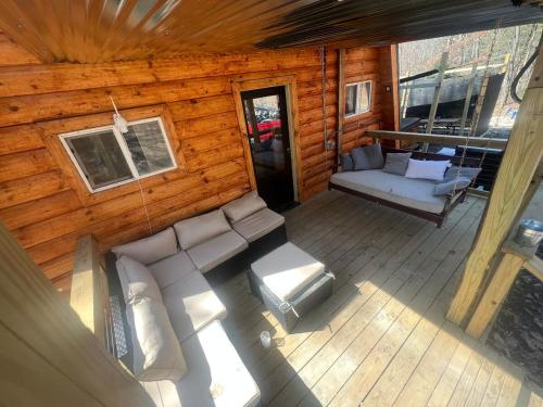 an overhead view of a porch of a log cabin at Cabin in the treetops! in Lancaster