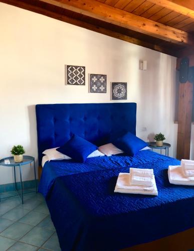 Postel nebo postele na pokoji v ubytování Affitti Brevi SCALA DEI TURCHI