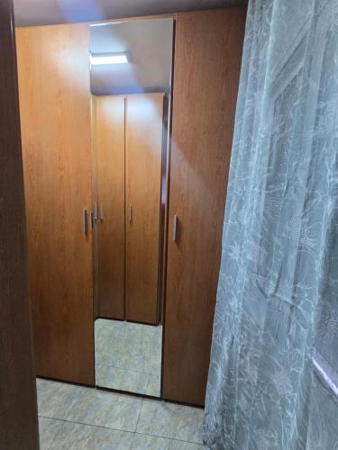 a door in a room with a curtain at Casa del Campo in Els Hostalets