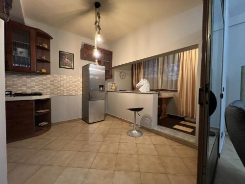 Η κουζίνα ή μικρή κουζίνα στο Elly Apartment