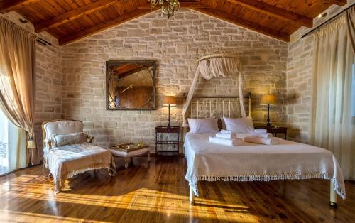 Postel nebo postele na pokoji v ubytování Eleon Residence