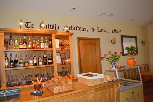 Lounge nebo bar v ubytování Rudzupuķes