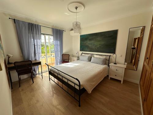 Postel nebo postele na pokoji v ubytování Villa Amalia in Olhão