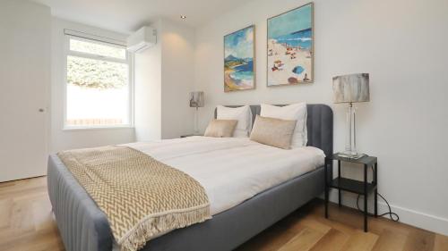 Postel nebo postele na pokoji v ubytování Steenhof Beach House