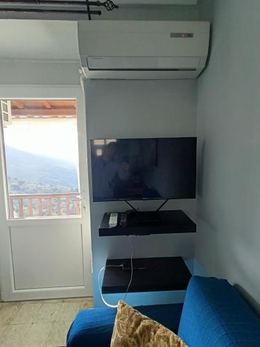 TV a/nebo společenská místnost v ubytování Methea