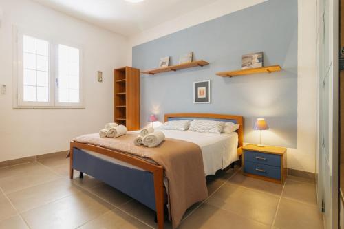 Postel nebo postele na pokoji v ubytování Cala Bernardo Apartment