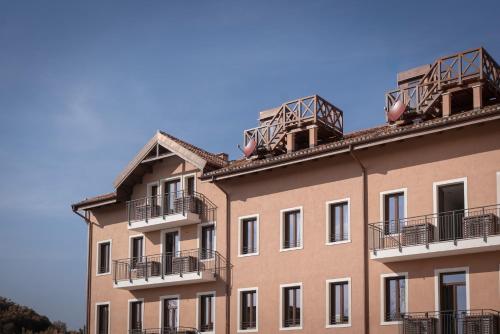 a large building with balconies on top of it at Palazzo dei Guardiani in Venice