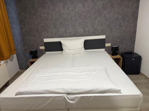 Postel nebo postele na pokoji v ubytování Hotel Eurocity