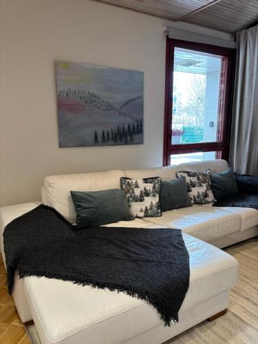 Postel nebo postele na pokoji v ubytování Staycation apartment Hyvinkää