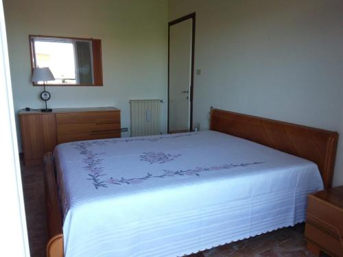 Postel nebo postele na pokoji v ubytování Appartamento SoleeMare